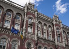 Ukraine has eased currency restrictions to allow businesses to pay foreign loans.