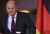 Scholz rules out a country at war joining NATO and speaks of peace.