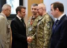 Macron urges NATO to begin planning for Ukraine's security guarantees.